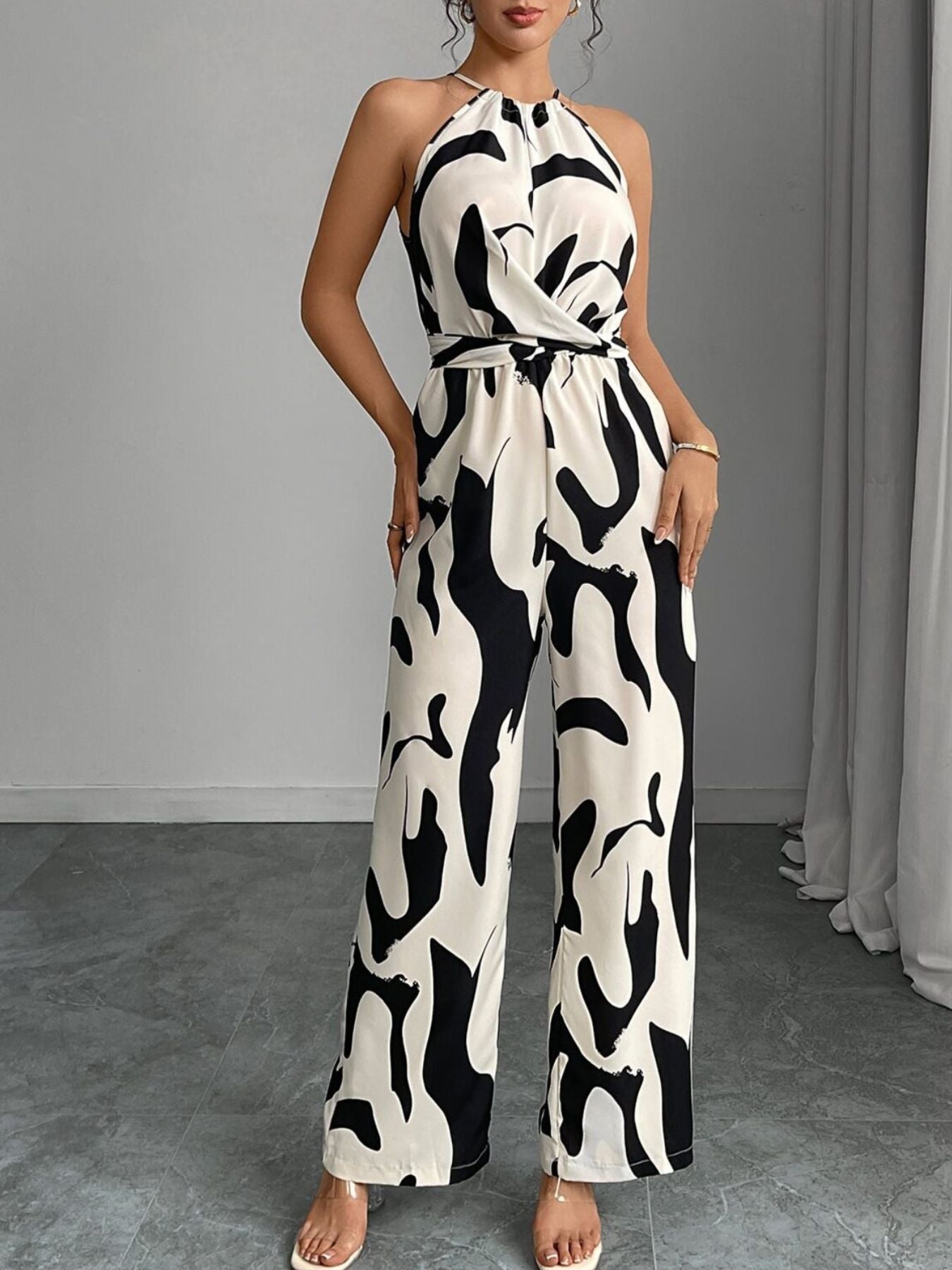 Elara | Women's Abstract Print Halter Neck Tie Waist Wide Leg Jumpsuit