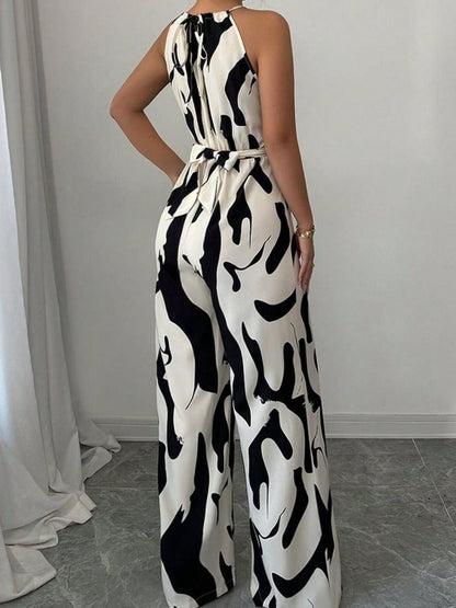 Elara | Women's Abstract Print Halter Neck Tie Waist Wide Leg Jumpsuit