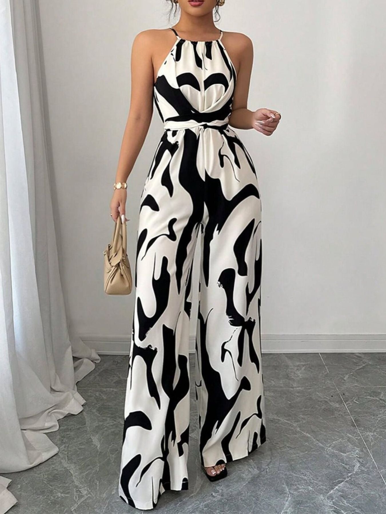 Elara | Women's Abstract Print Halter Neck Tie Waist Wide Leg Jumpsuit